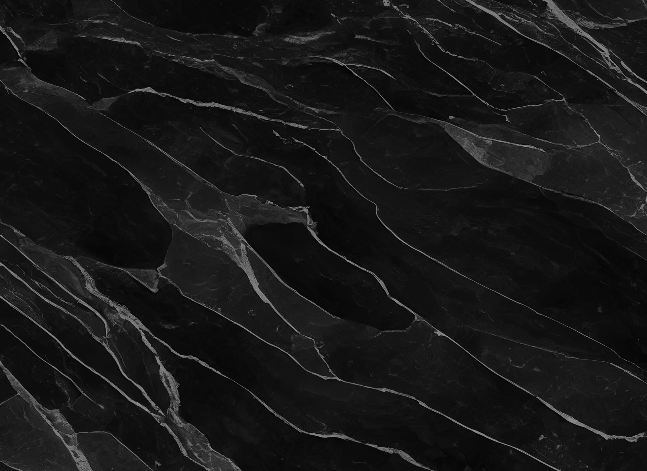 Black marble texture with white veining.