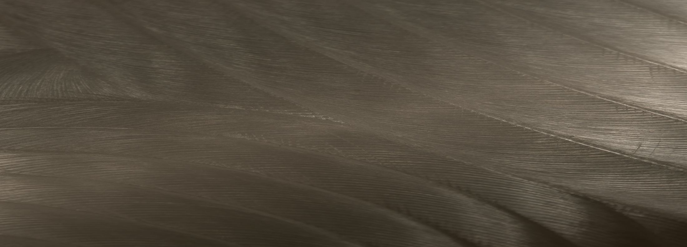 Abstract metal texture with flowing patterns.
